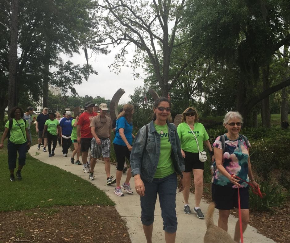Group of people walking in park