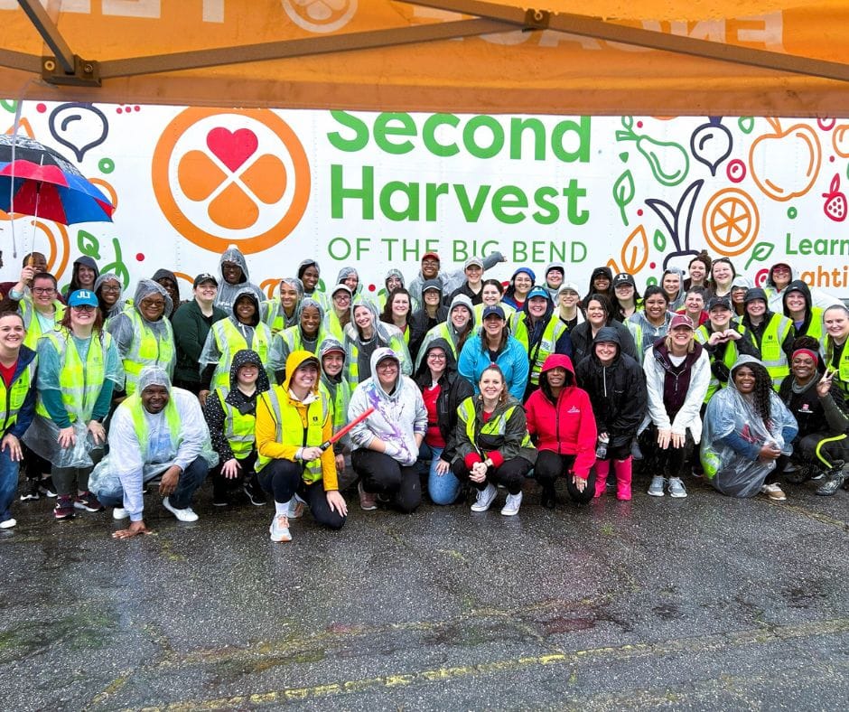 Group of people taking a picture for the Second Harvest of the BIg Bend