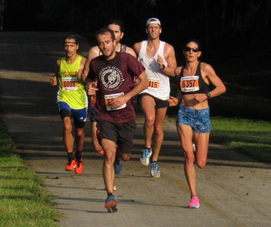 Group of people running together