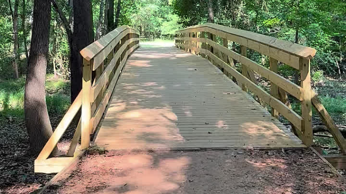 Bridge from Tom Brown Park to the trail system, including Lafayette Heritage Trail